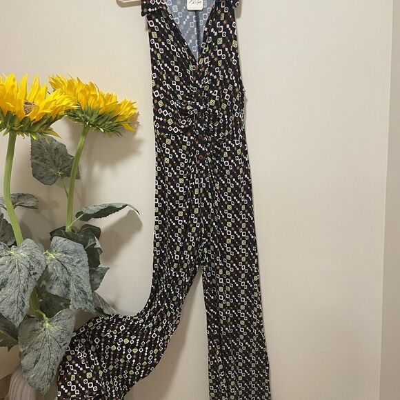 NWT Shayla Halter jumpsuit size S
NWT 
Retail $148 - Picture 4 of 9